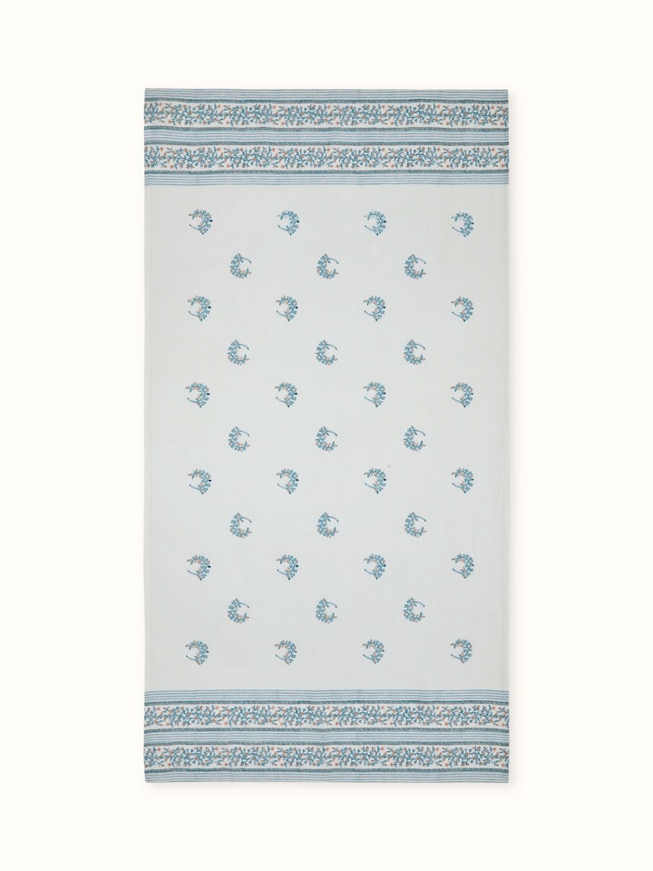 Ambi allover blue floral cotton Sanganeri block printed bath towel (L) with vibrant blue floral block print design.