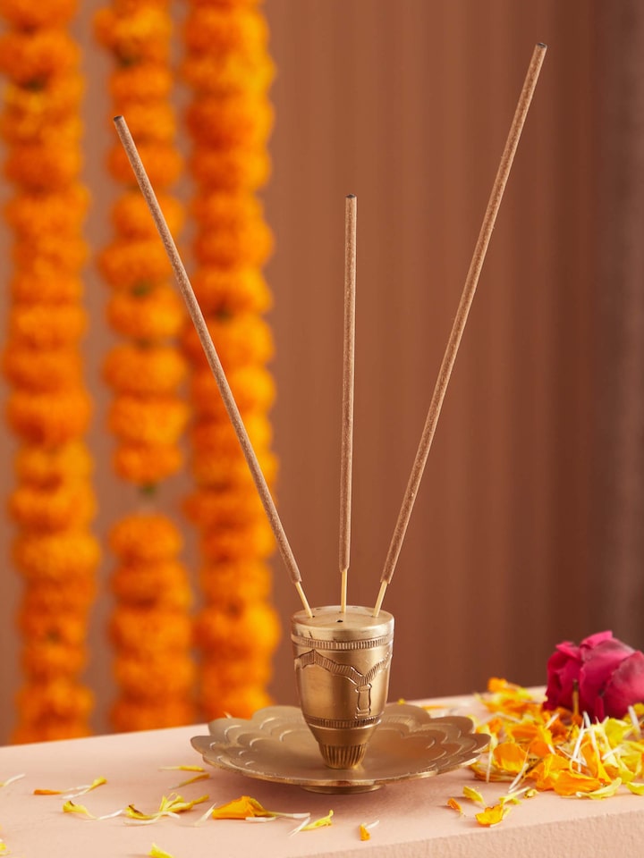 Side view of polished brass incense stick holder highlighting its sleek profile and high-quality finish