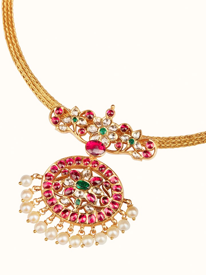 Angled view displaying the elegant design and texture of the 22 Karat gold necklace