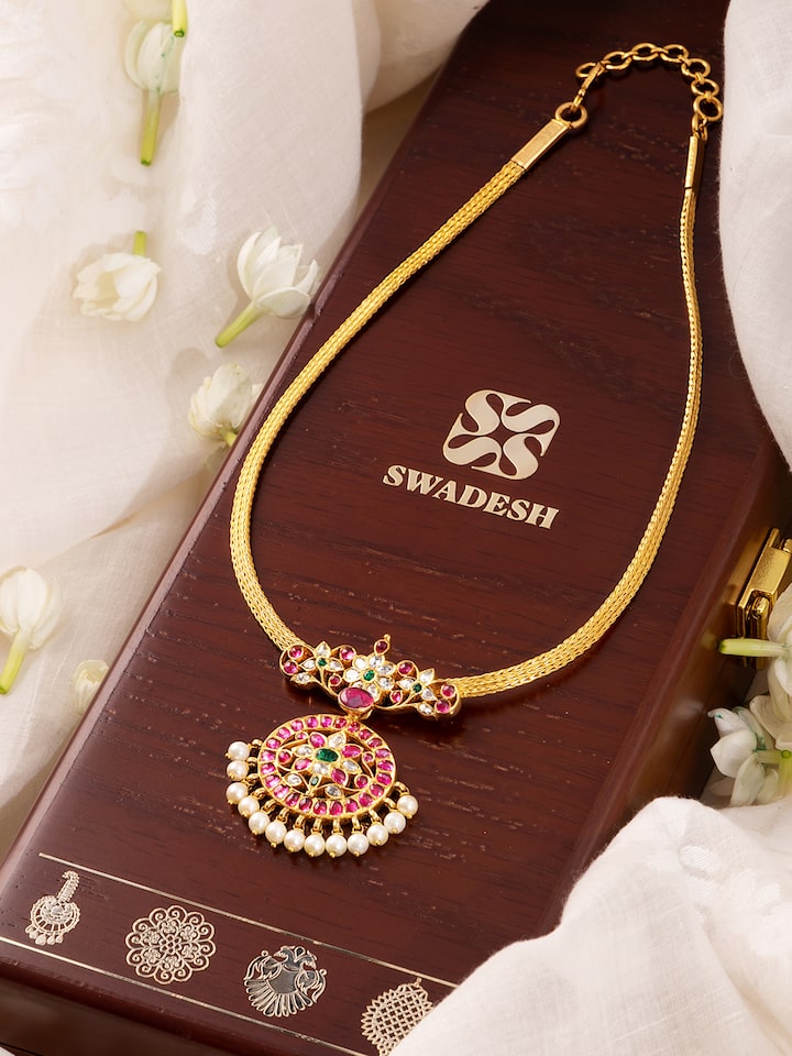 Another perspective showcasing the necklace’s curved form and fine detailing
