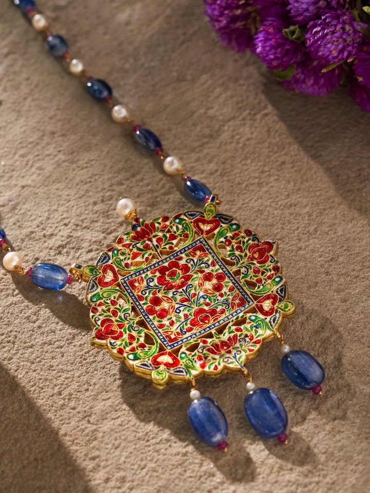 Back view of Badroom gold pendant and chain showing clasp design and pendant's reverse surface