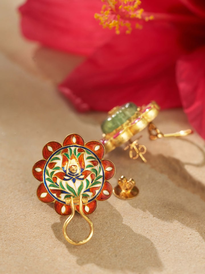 Detailed view of Jadau 18 Karat Gold Studs emphasizing the intricate gold design and craftsmanship