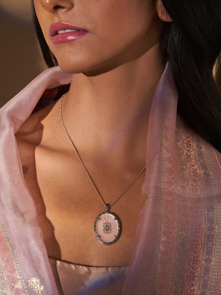 Side view of Lapidary 14 Karat Gold Pendant & Chain highlighting the elegance of the gold pendant and chain.