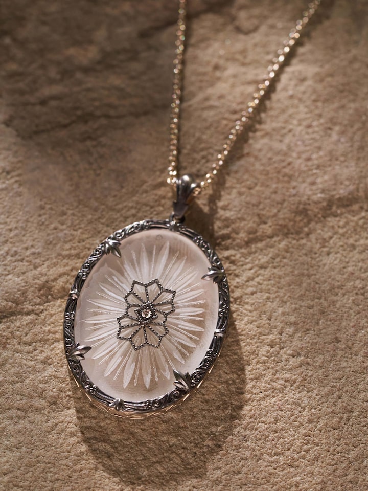 Detailed view of Lapidary 14 Karat Gold Pendant & Chain focusing on the intricate design and gold finish.