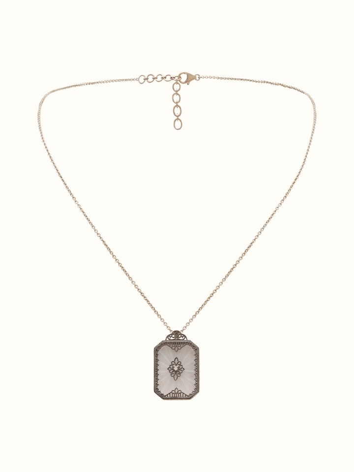 Front view of Lapidary 14 Karat gold pendant and chain featuring elegant goldwork.