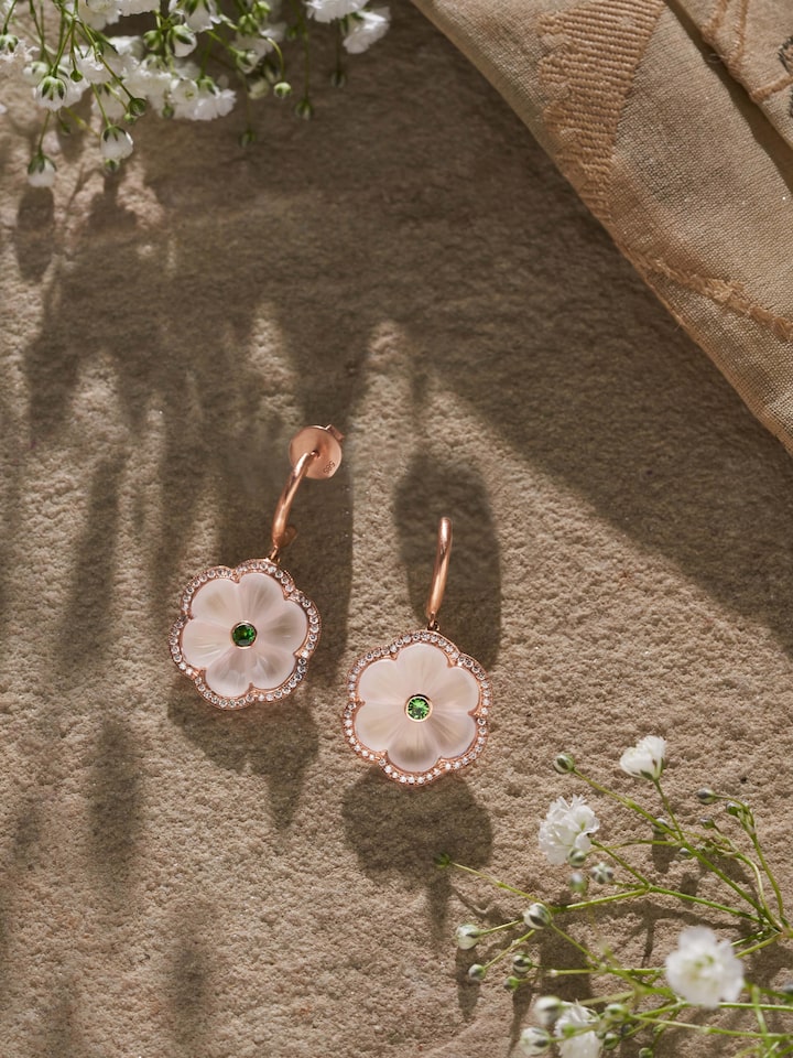 Close-up of Lapidary 14 Karat Gold Drop Earrings showcasing detailed gold work and craftsmanship.