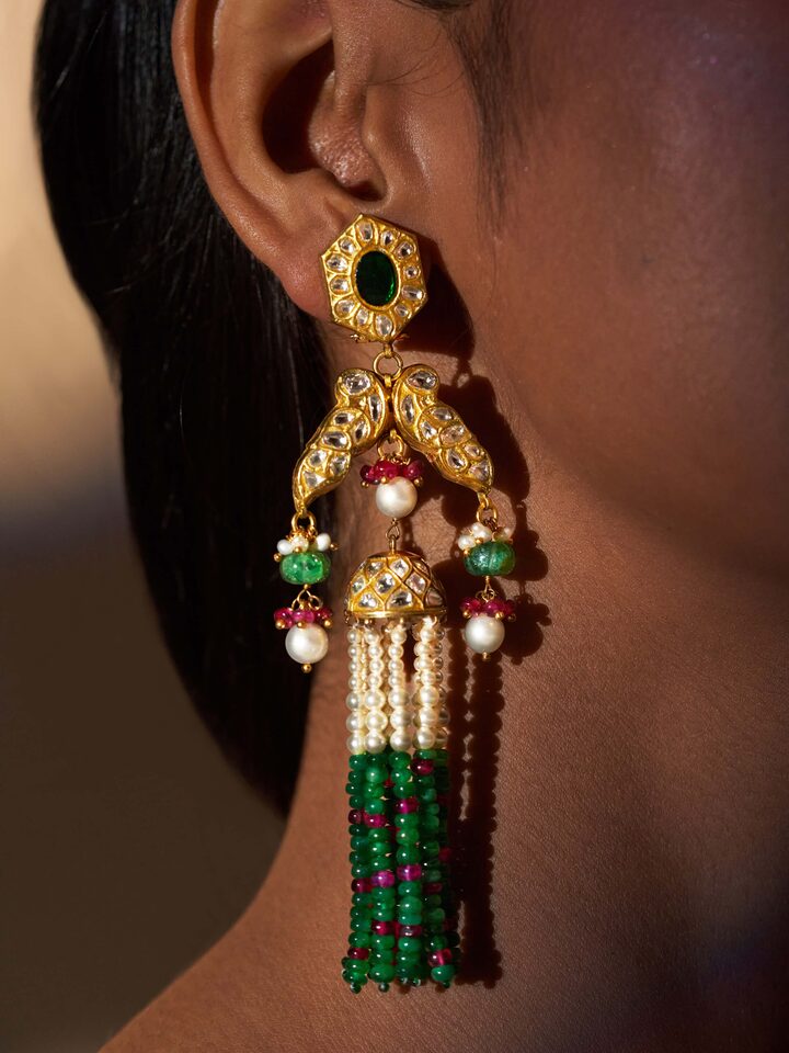 Close-up of Thappa 22 Karat gold earrings showing traditional Thappa craftsmanship.