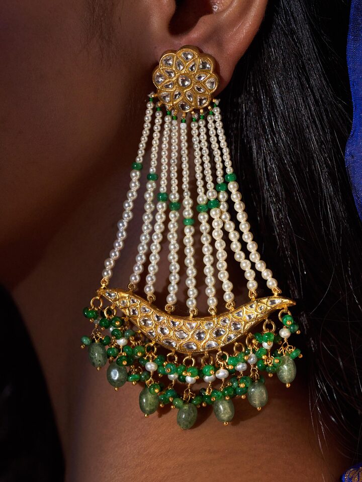 Close-up detail highlighting intricate embossing on 22 Karat gold drop earrings