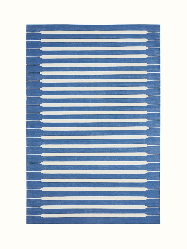 Top view of Modern geo stripe blue lawan cotton panja dhurrie showcasing its geometric stripe pattern and blue color.