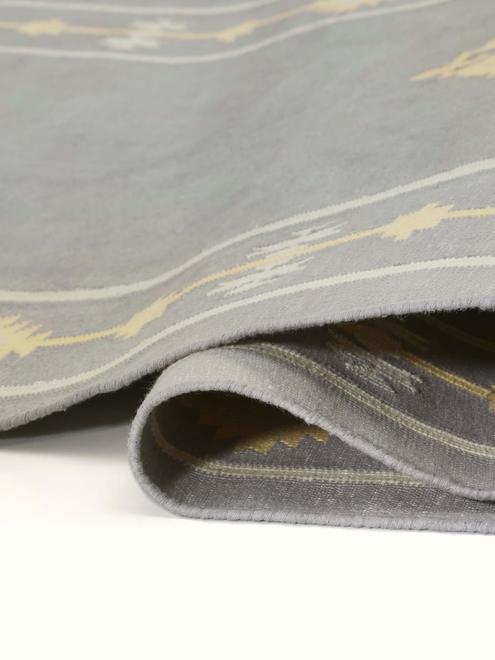 Detailed view of Traditional Kilim grey yellow Lawan cotton Panja dhurrie, focusing on the fabric and pattern