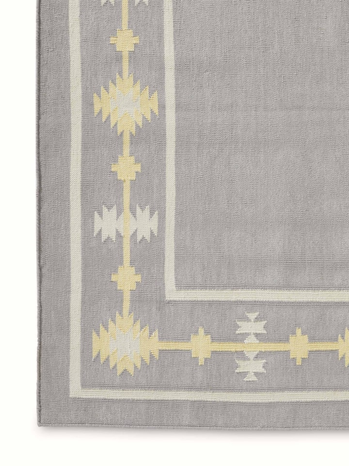 Traditional Kilim grey yellow Lawan cotton Panja dhurrie, displaying its pattern and texture