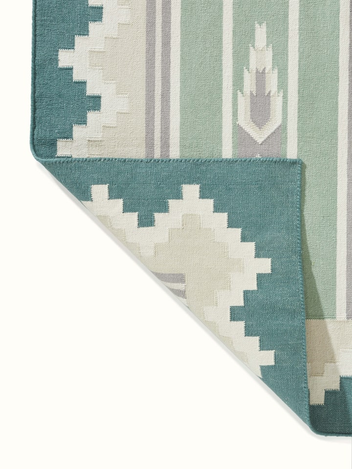 Full view of Modern Geo green lawan cotton panja runner in a room setting