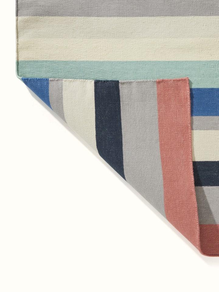 Top view of Modern Geo Stripe Lawan Cotton Panja Dhurrie, showcasing the overall design and color arrangement.