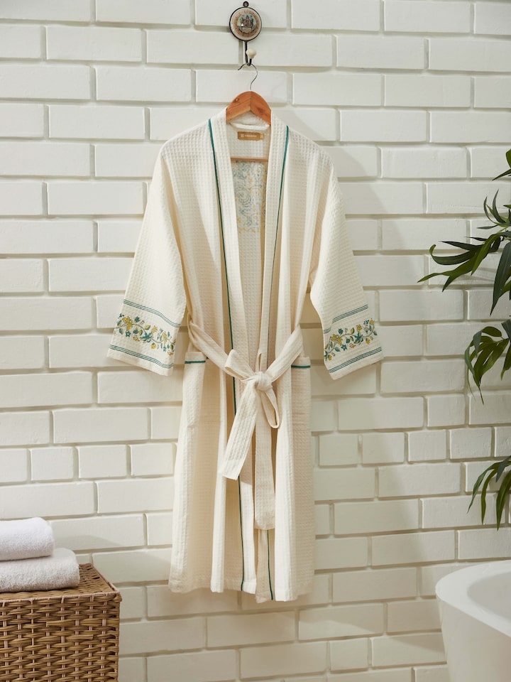 Detailed view of Palampore Buta Yellow & Green Floral Cotton Sanganeri Block Printed Bathrobe emphasizing fabric and print