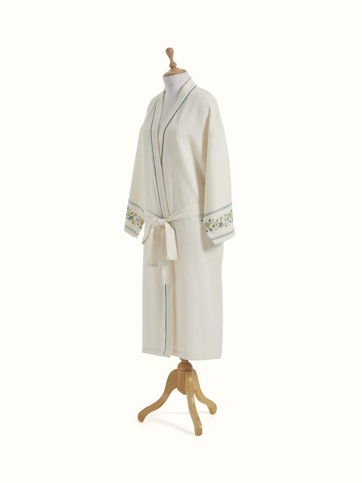 Front view of Palampore Buta Yellow & Green Floral Cotton Sanganeri Block Printed Bathrobe with focus on vibrant colors
