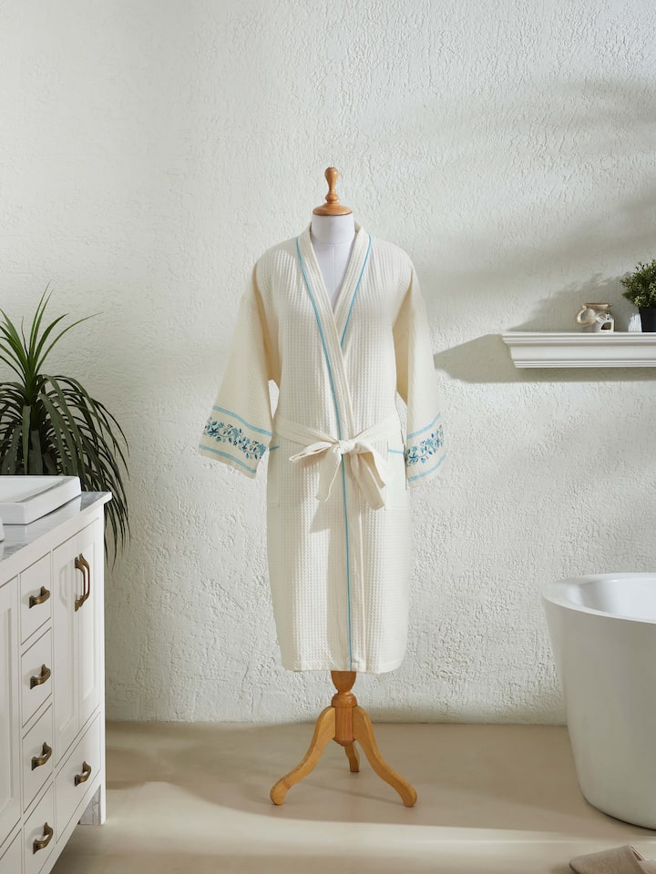 Side view of Blue floral cotton Sanganeri block printed bathrobe highlighting the detailed floral block print and fabric.