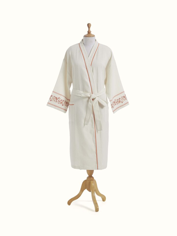 Front view of Palampore buta peach floral cotton Sanganeri block printed bathrobe showcasing floral print and design