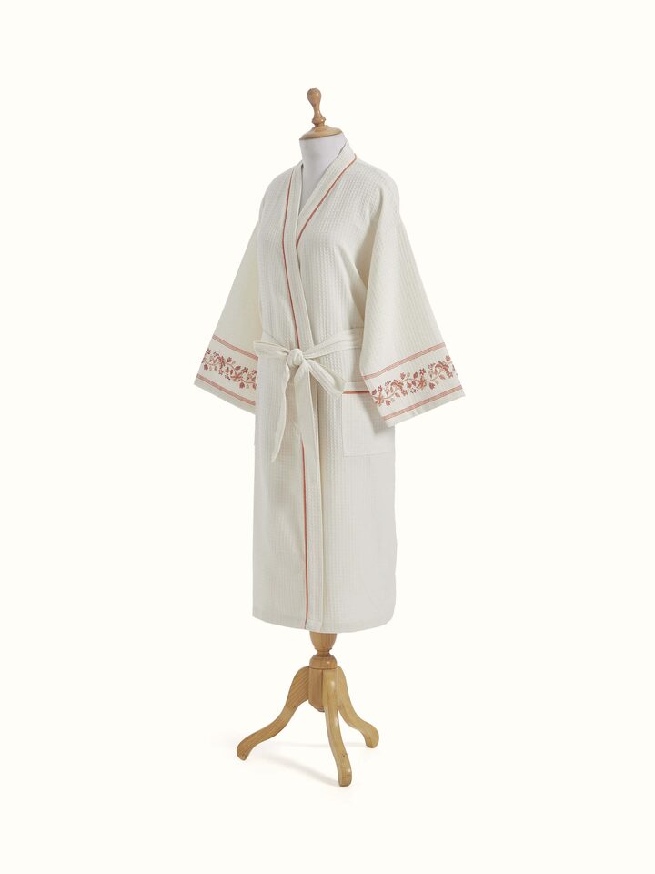 Back view of Palampore buta peach floral cotton Sanganeri block printed bathrobe showing overall design and print
