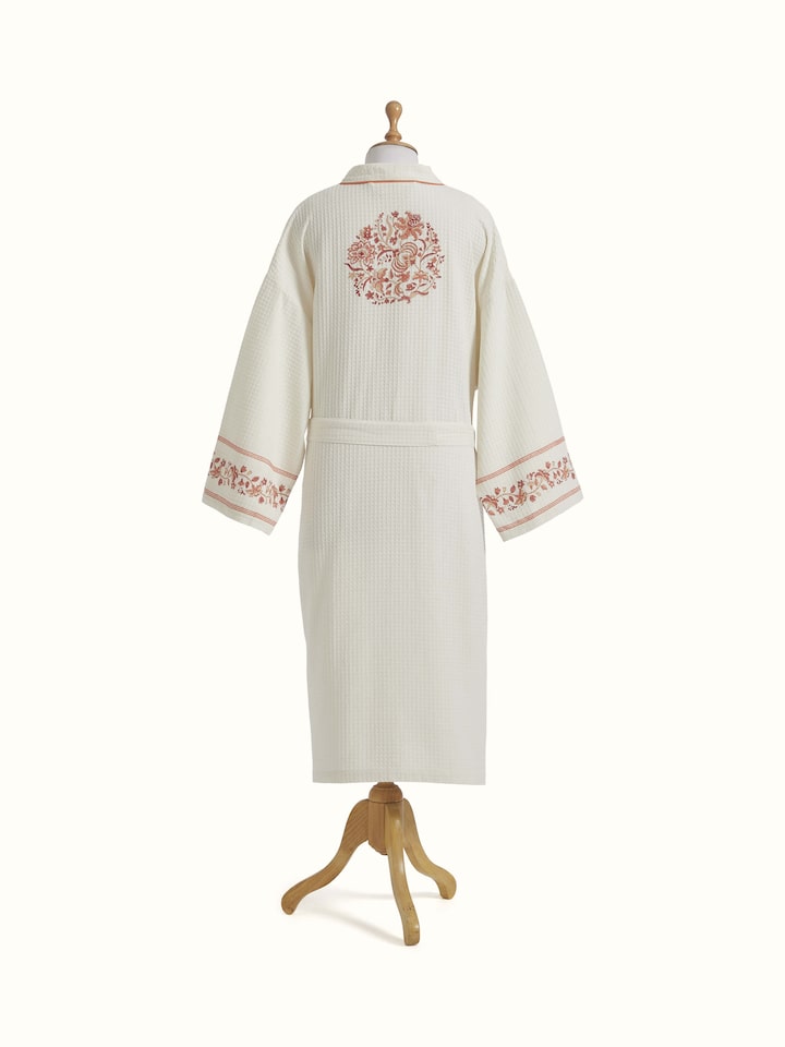 Detailed view of Palampore buta peach floral cotton Sanganeri block printed bathrobe showing fabric and print