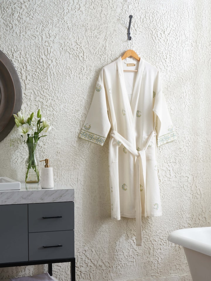 Detail of Ambi Buta yellow floral cotton Sanganeri block printed bathrobe