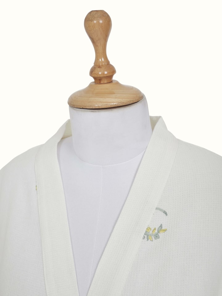 Side view showing the Ambi Buta yellow floral cotton Sanganeri block printed bathrobe