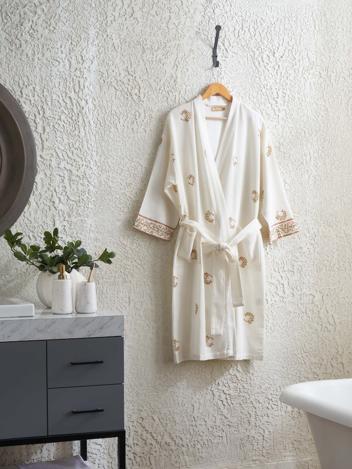 Styled view of Ambi Buta Peach Floral Cotton Sanganeri Block Printed Bathrobe styled on a model