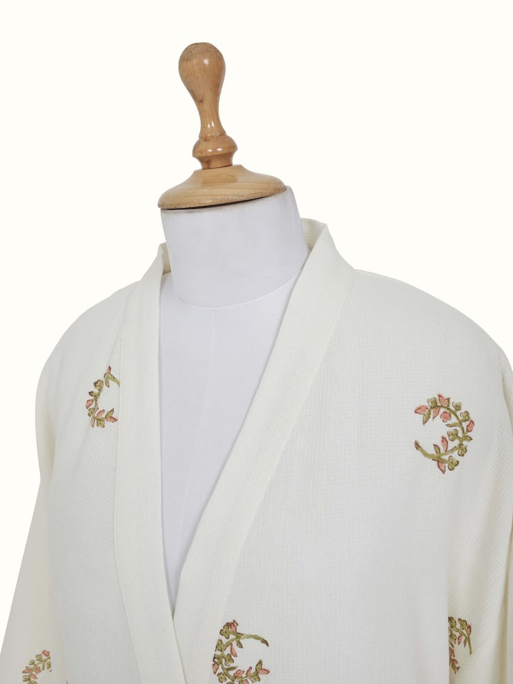 Detail view of Ambi Buta Peach Floral Cotton Sanganeri Block Printed Bathrobe highlighting the embroidery and stitch detail