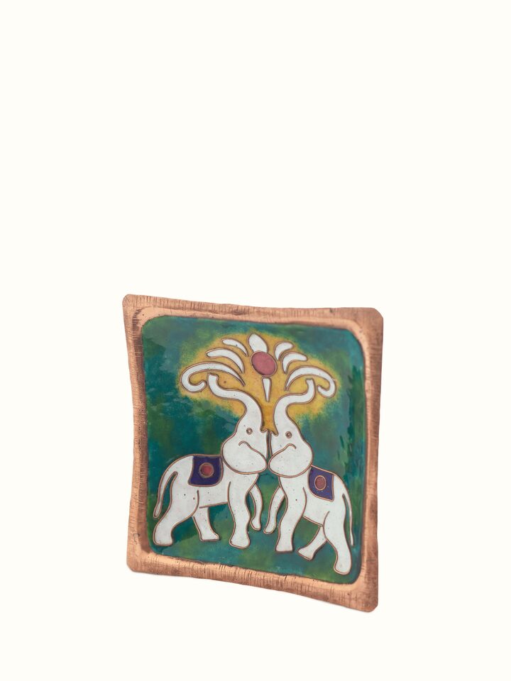 Side view of copper tray showing its rich color and texture.