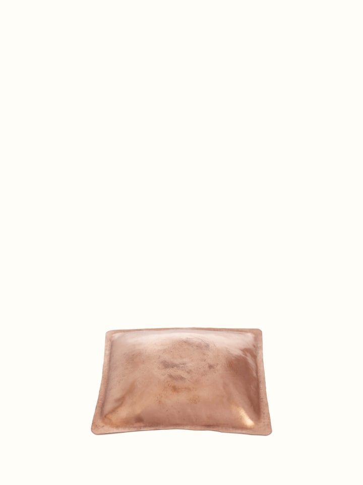 Copper tray displaying intricate detailing and polished surface.