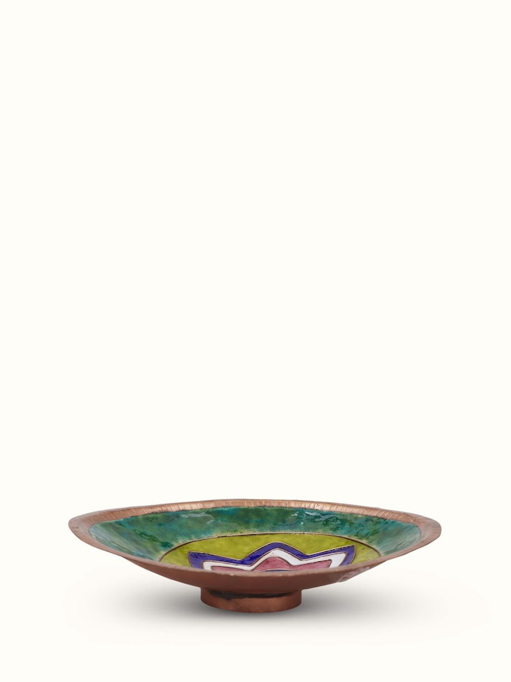 Front view of copper nut bowl with smooth finish and elegant design