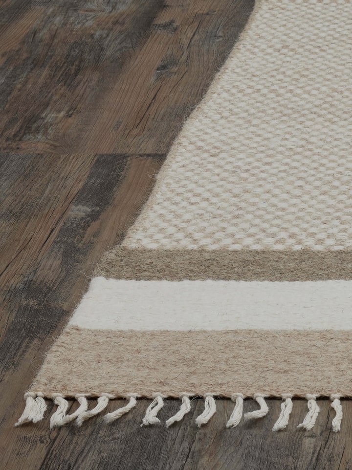 Close-up of Geo checkered beige Jawaja wool & cotton handloom dhurrie (3x5 ft) showing the detailed checkered pattern and texture.