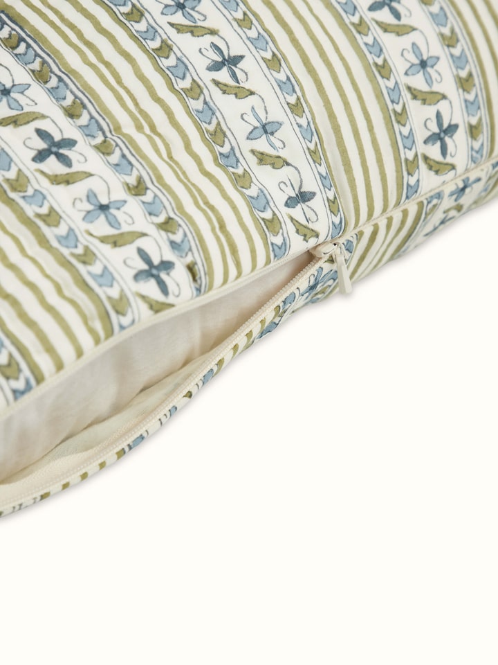 Side view of Aarunya blue floral stripe cotton Sanganeri block printed cushion cover emphasizing the pattern and edge details.
