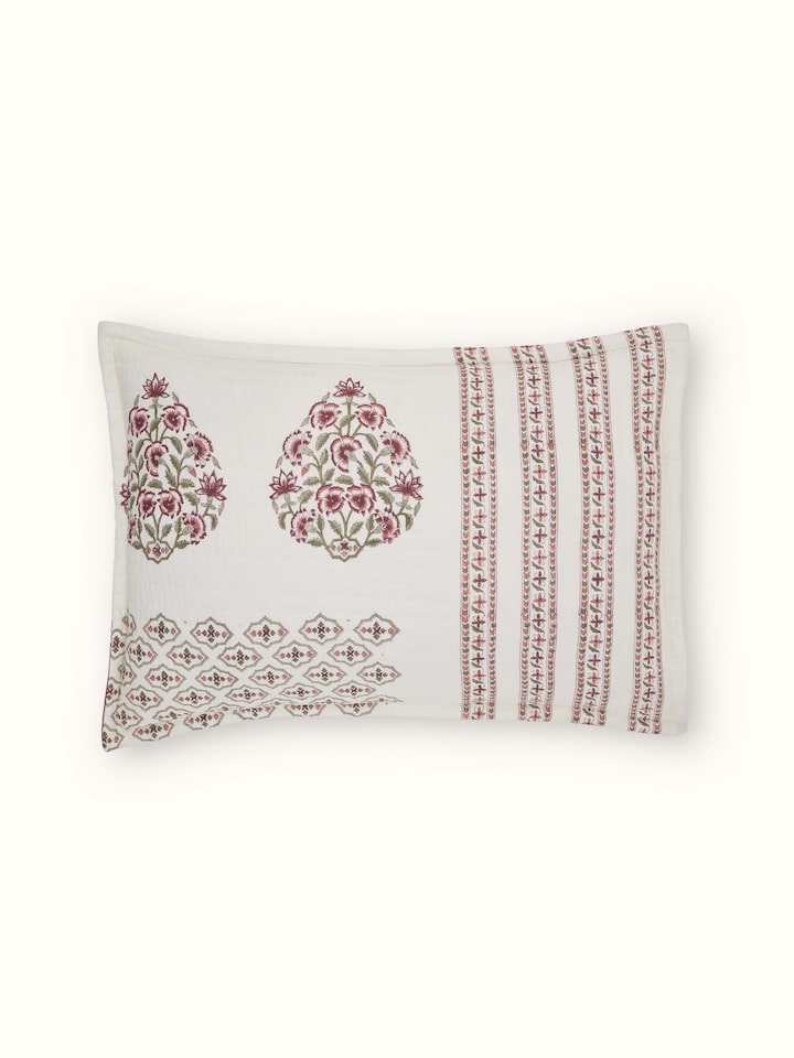 Full view of Aarunya red floral cotton pillow shams displayed to emphasize the block print design and fabric texture.