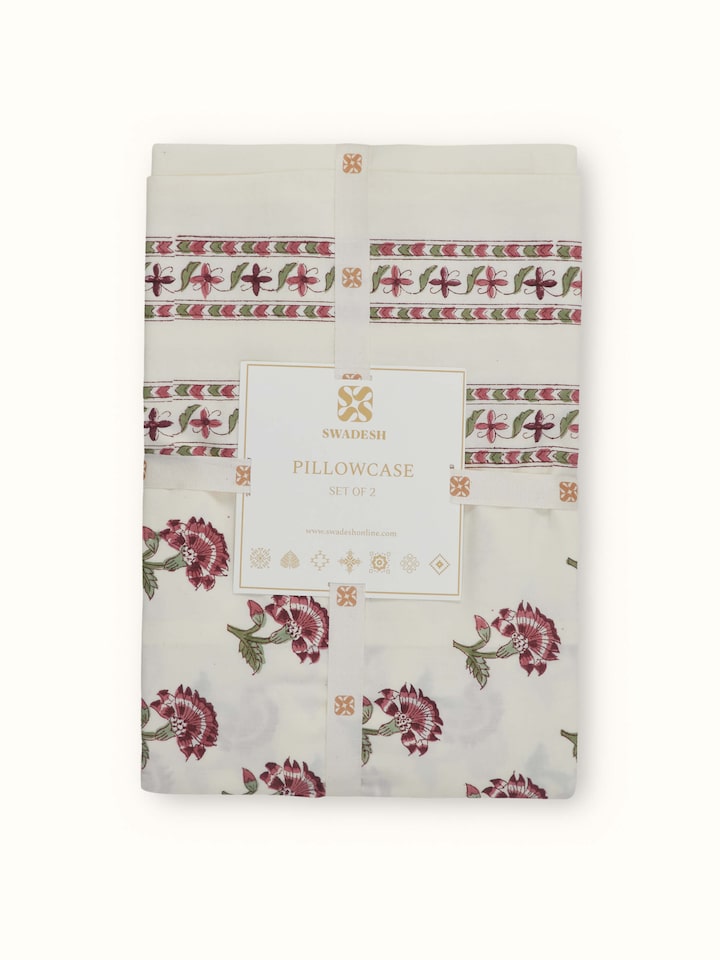Side view of Aarunya Red Stripe Sanganeri block printed pillow cases showing the fabric drape and stripe design