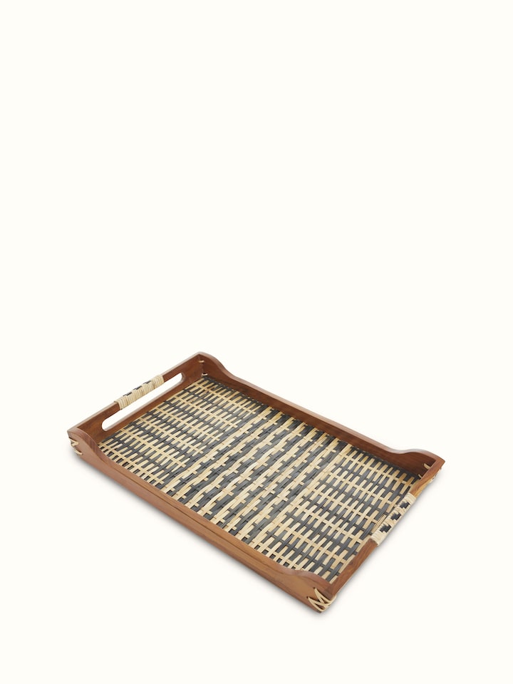 Close-up of bamboo and teak wood decorative tray, focusing on the detailed wood carvings and finish.