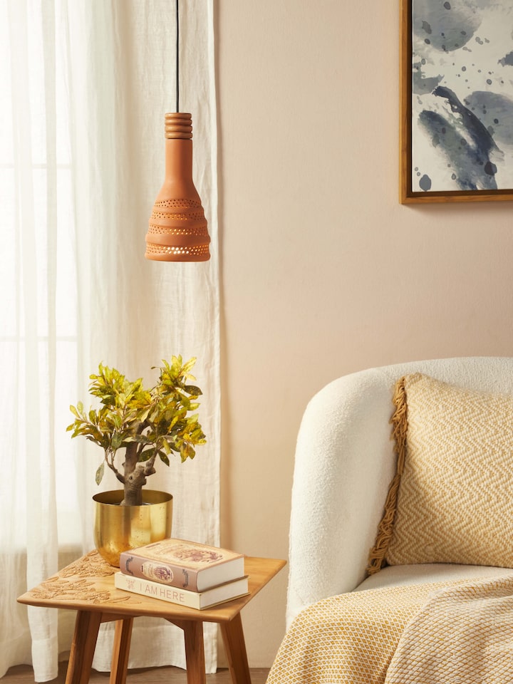 Close-up detail of Terracotta Pendant Lights Tall (2 pcs) focusing on the texture and design of the terracotta.