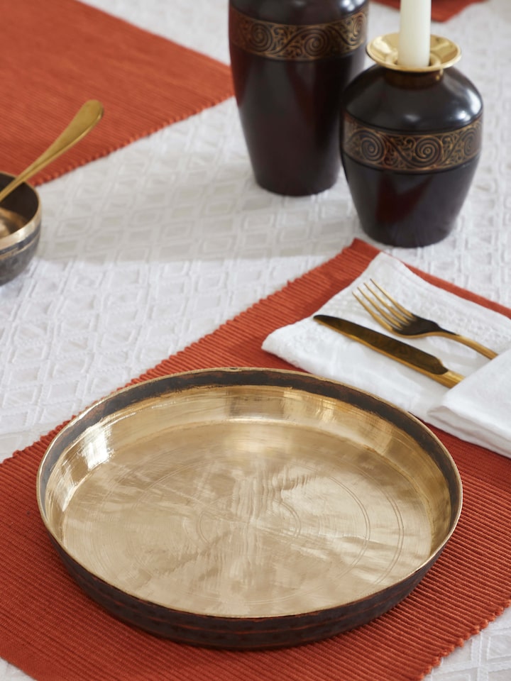 Side view of Bell Metal Dinner Plate (11 inches) showing its sleek design and quality.