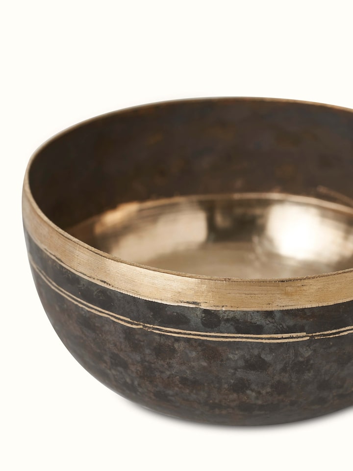 Top view of Bell metal dinner bowls highlighting their round shape and finish.