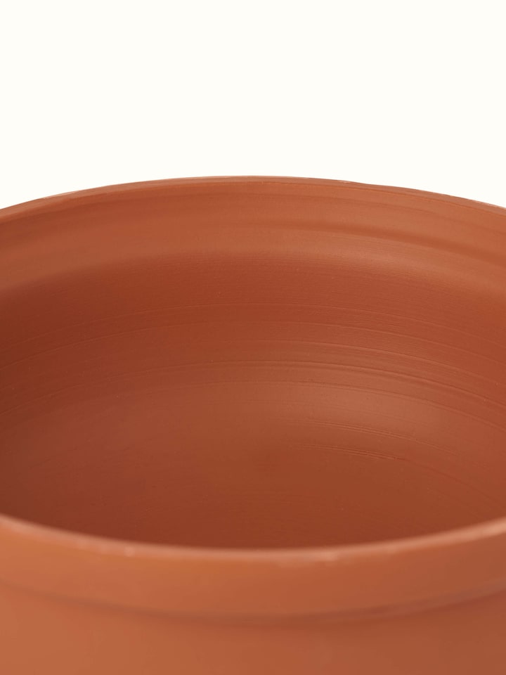 Detailed shot of Terracotta Clay Kadhai highlighting the handmade craftsmanship and earthy tones.