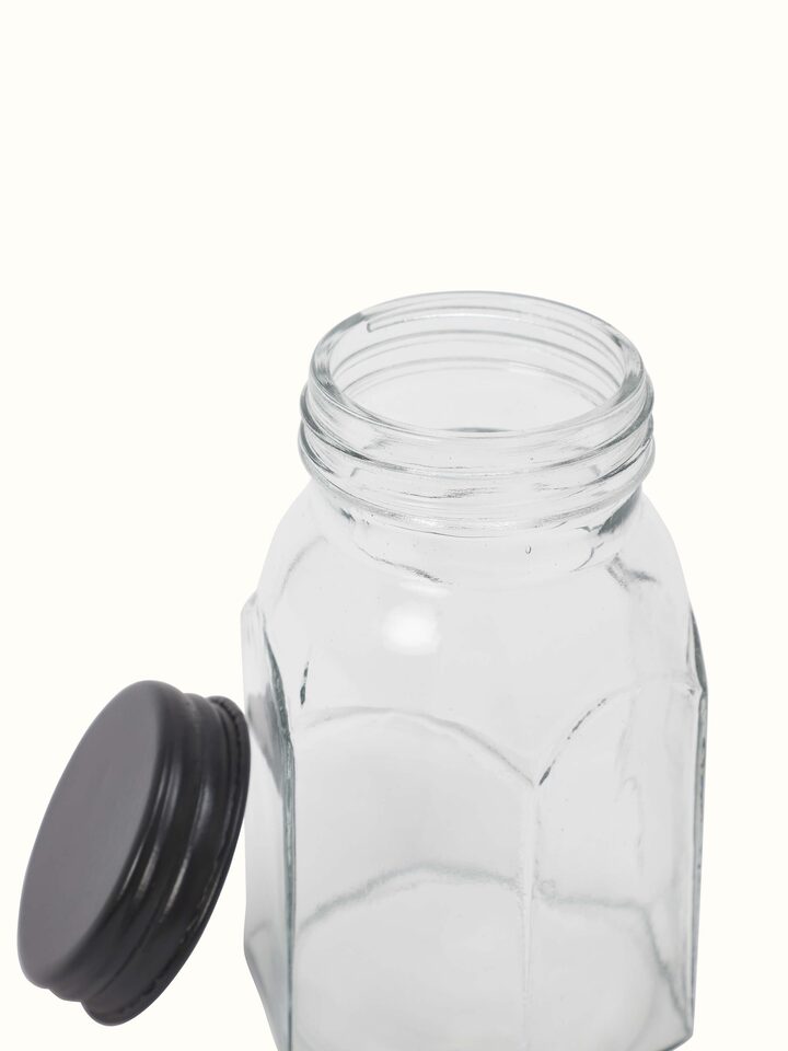 Side view of Firozabadi glass work jar with grey lid showing intricate glasswork and finishing