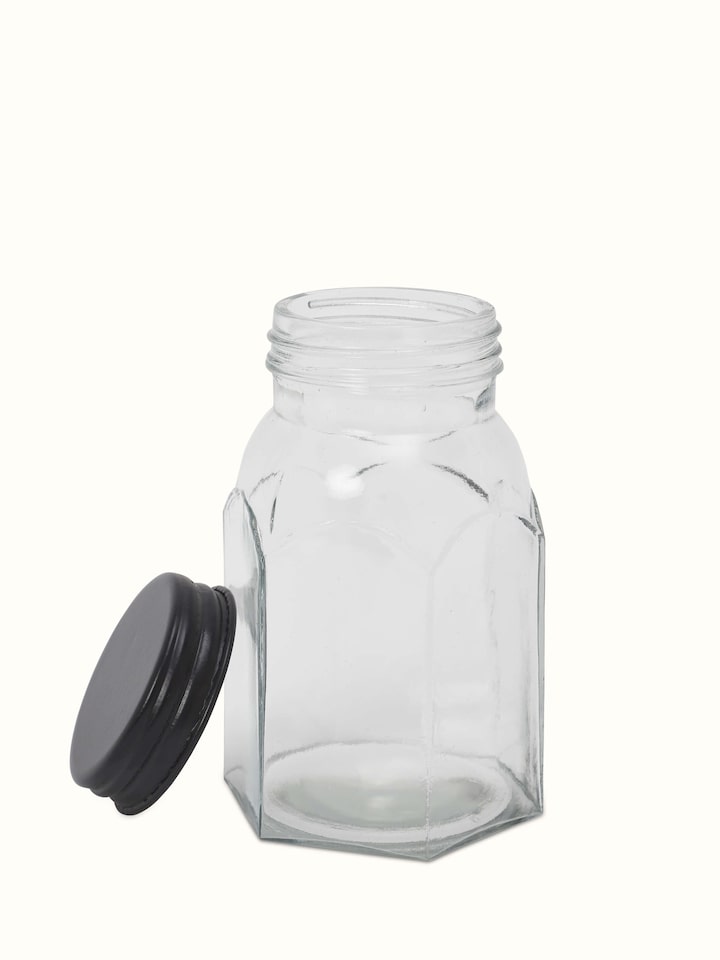 Detailed close-up of Firozabadi glass work jar with grey lid focusing on design and glass quality
