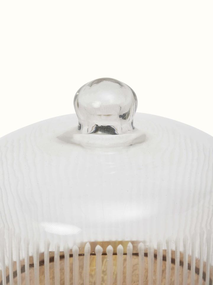 Angled view of glass-worked bell jar, emphasizing its stylish design and pristine finish.