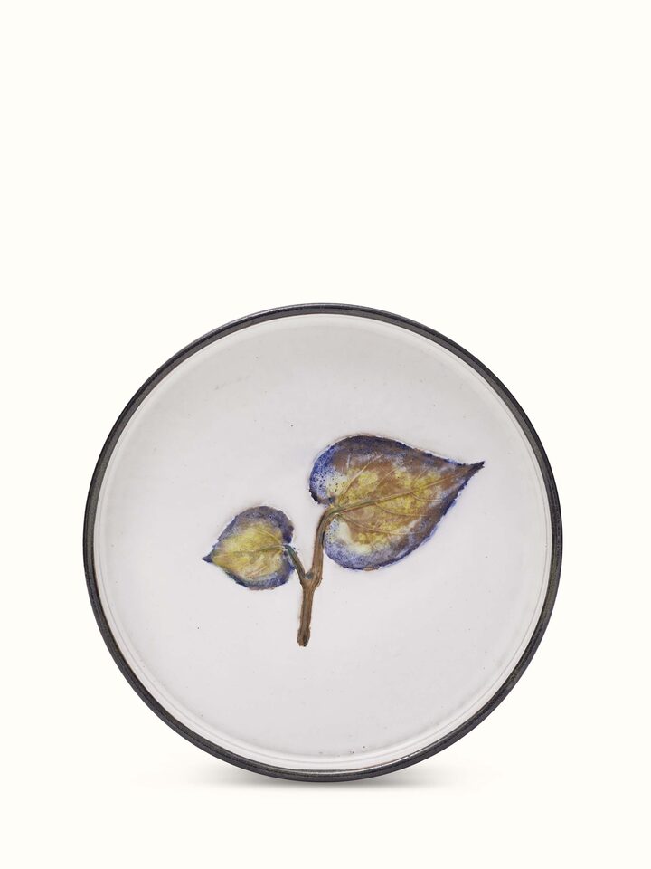 Front view of studio pottery ceramic dessert plate showcasing its artisanal design