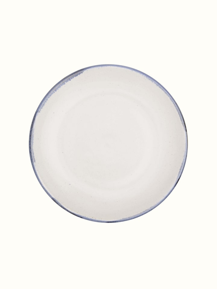 Angle view of Studio pottery ceramic salad plate white