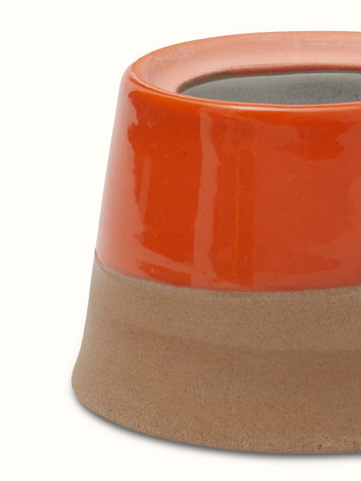 Detailed view of Studio Pottery ceramic condiments container set highlighting the smooth texture and intricate detailing.