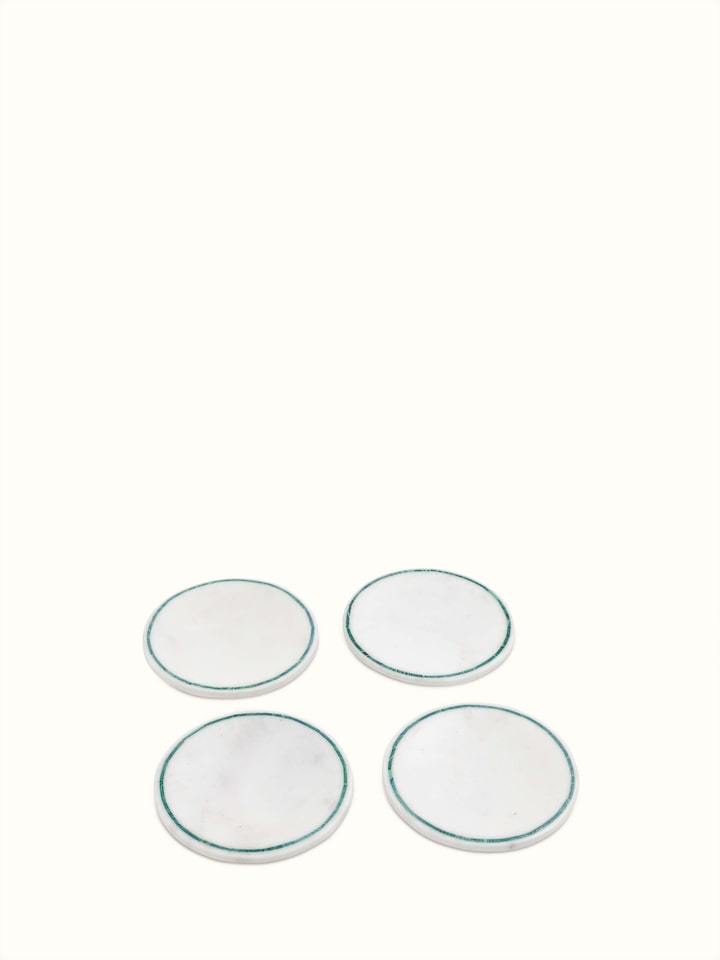 Side view of Marble Inlaid Coasters set featuring smooth edges and inlaid patterns