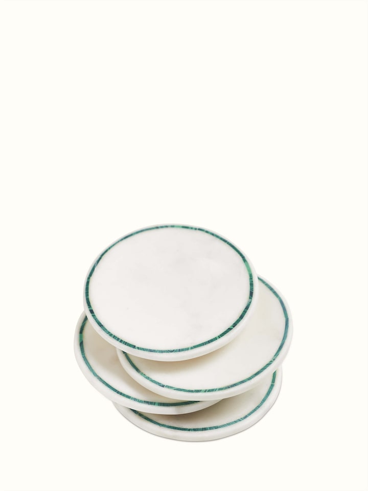 Top view of Marble Inlaid Coasters set with intricate design details