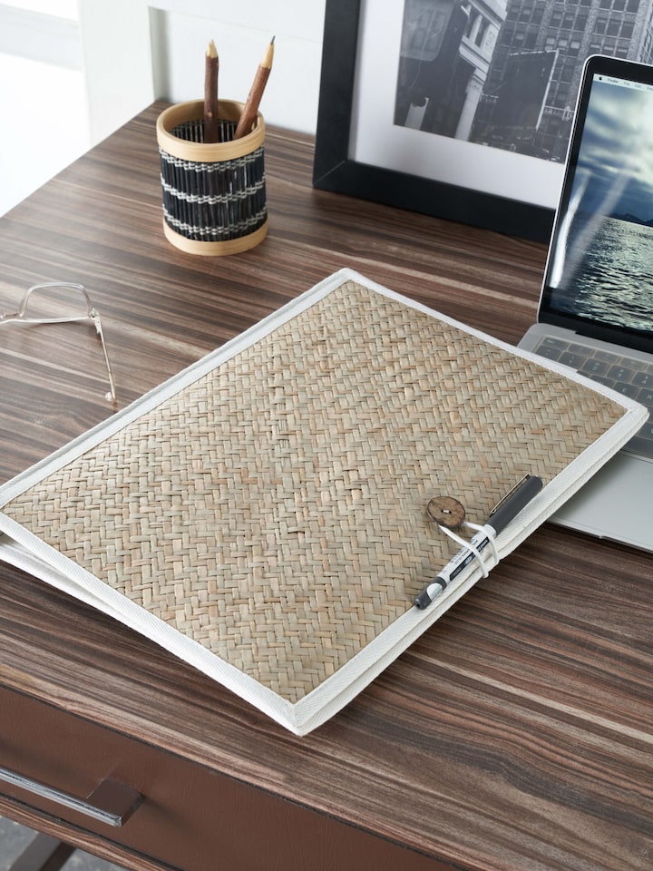 Side view of bamboo sital patti file folder in brown highlighting the traditional craftsmanship and sturdy build.