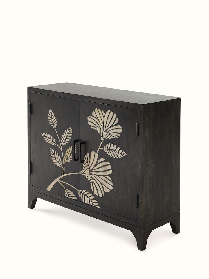 Angle view of Sand etched mango wood sideboard featuring the detailed craftsmanship and elegant design