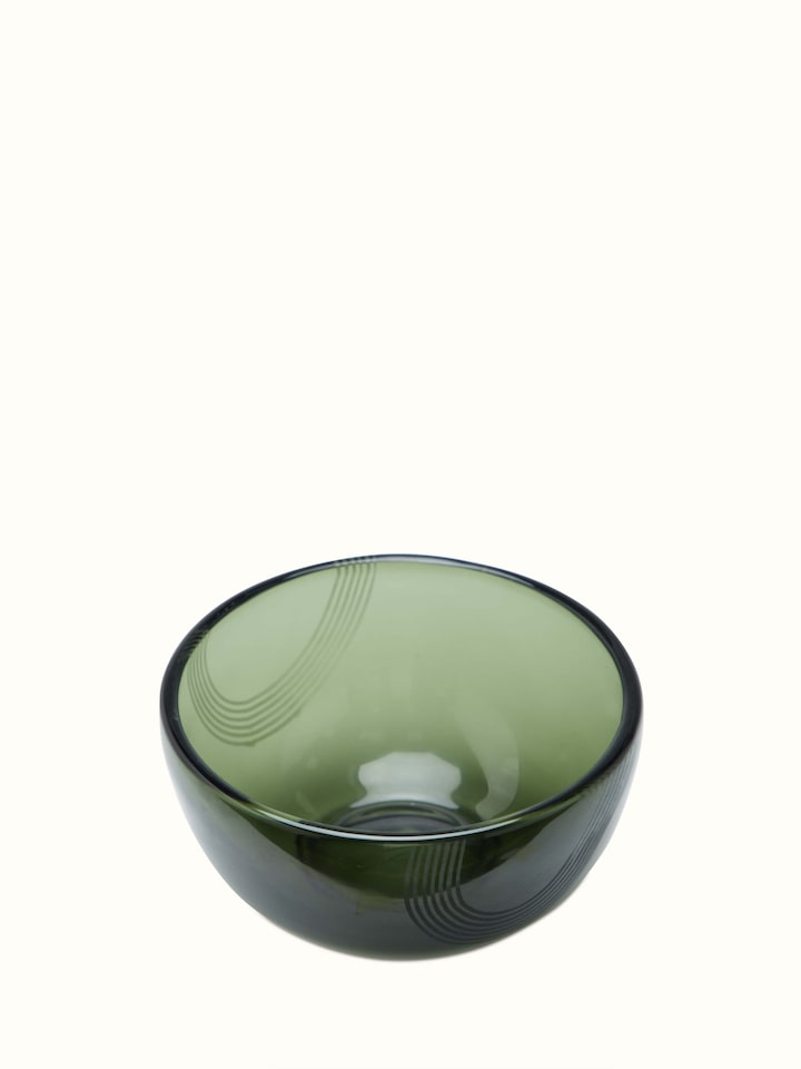 Side view of Firozabadi glass serving bowl in green medium size highlighting its sophisticated design and glass texture